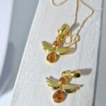 Amber angel pendant - Sterling silver